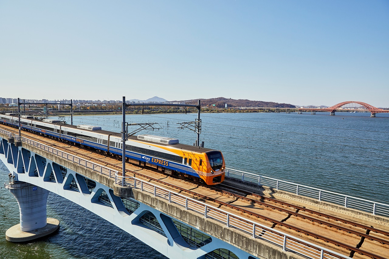 Experience seamless travel between Incheon International Airport and Seoul Station on the AREX Express Train. Enjoy comfortable seating scenic views and modern amenities for an efficient journey.